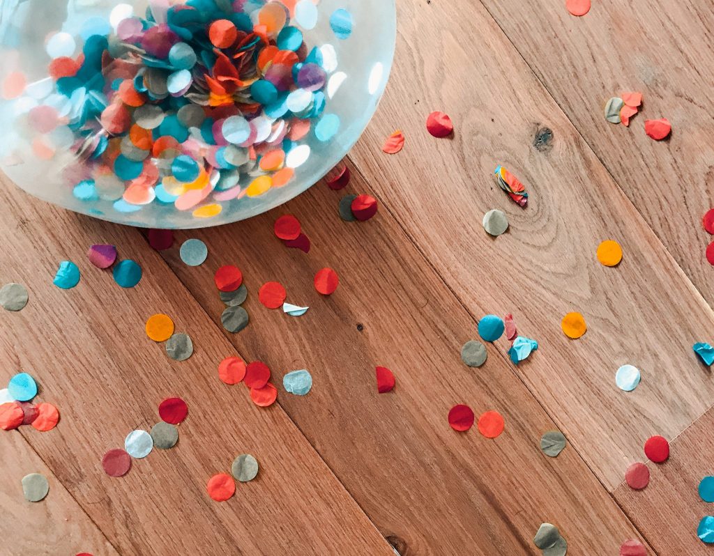 confetti scattered across table